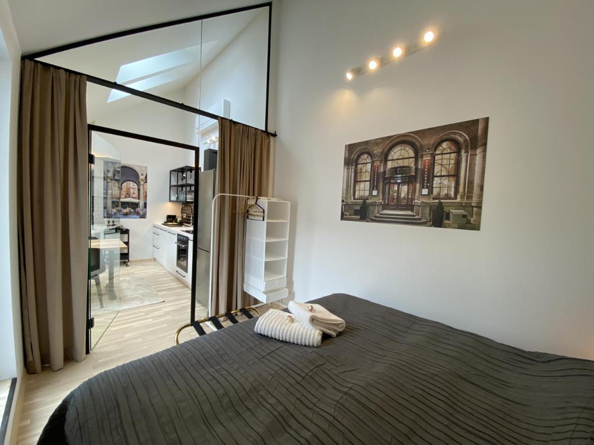Appartement Stilvolle Dachgeschosswohnungen Mit Balkon In Innenstadt Naehe